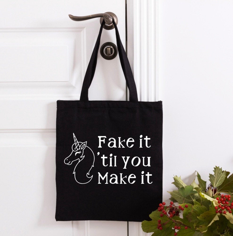 Fake it til you make it tote bag